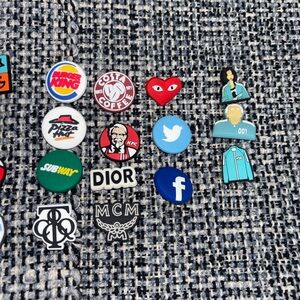 Jibbitz Multi-Brand Logo Charm Pins in Red, Blue, Green, Black, White